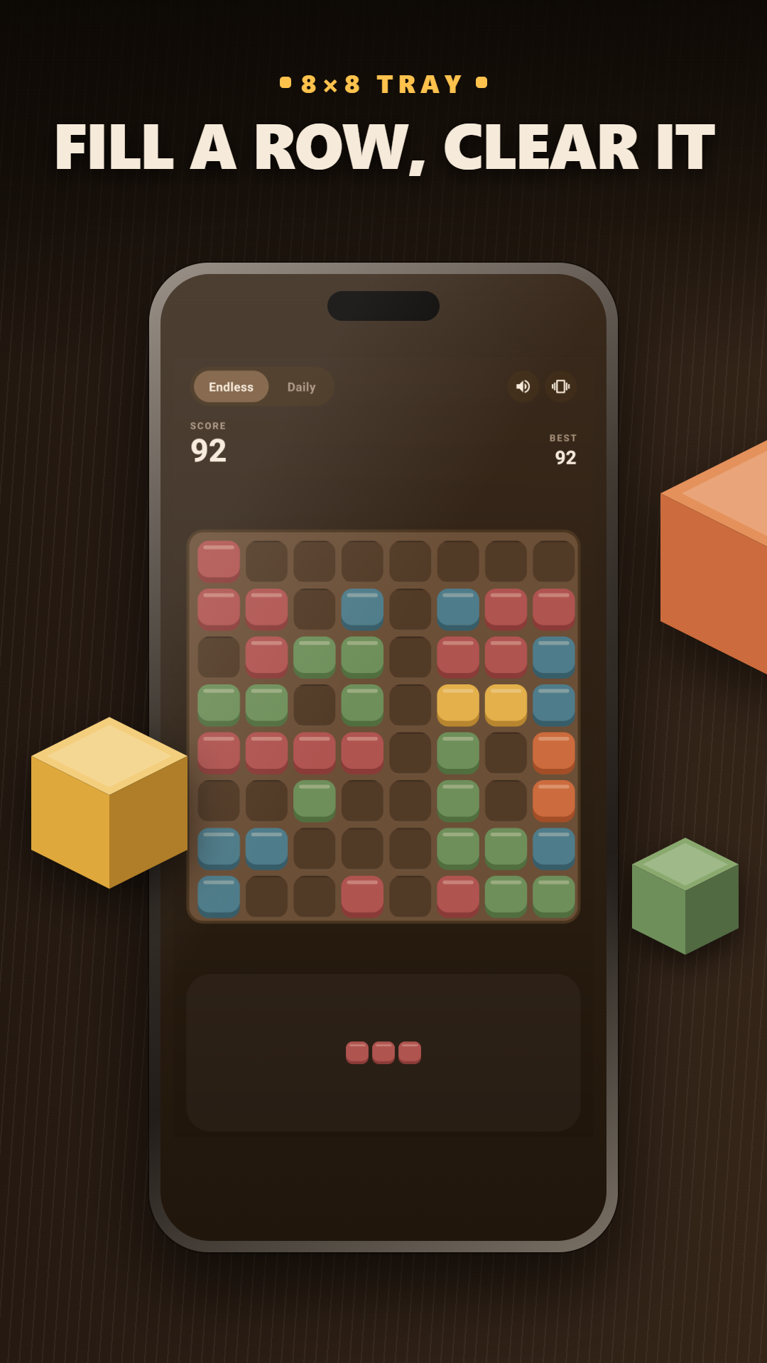 An 8x8 wooden tray part-filled with coloured blocks